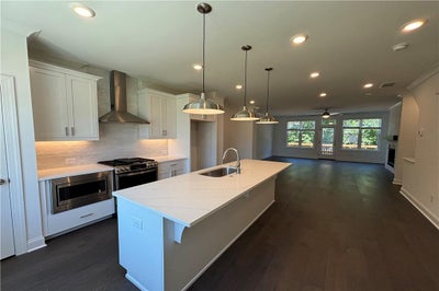 So much space in this kitchen..extra large island is perfect for food preparation! 145 Basil Street, 115, Cumming, GA