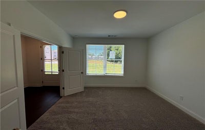 Terrace level bedroom/office space with own ensuite. 3br New Home in Cumming, GA