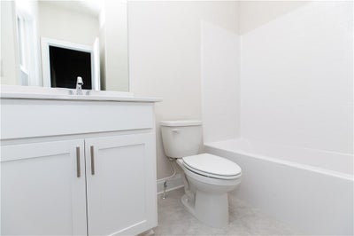 Secondary bedroom, private bathroom. Picture not of actual home for representation purposes only. New Home in Cumming, GA