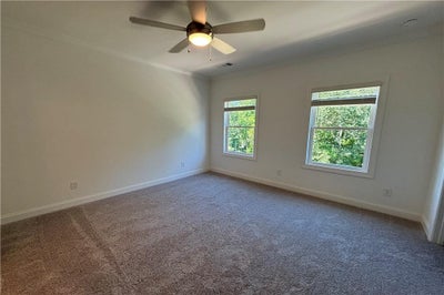 Primary bedroom has tons of light. 1,893sf New Home in Cumming, GA